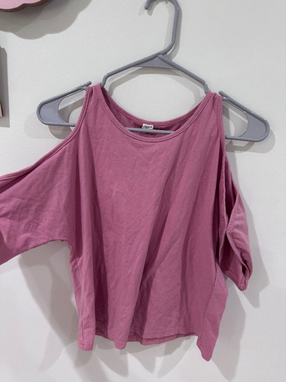 pink off the shoulder shirt